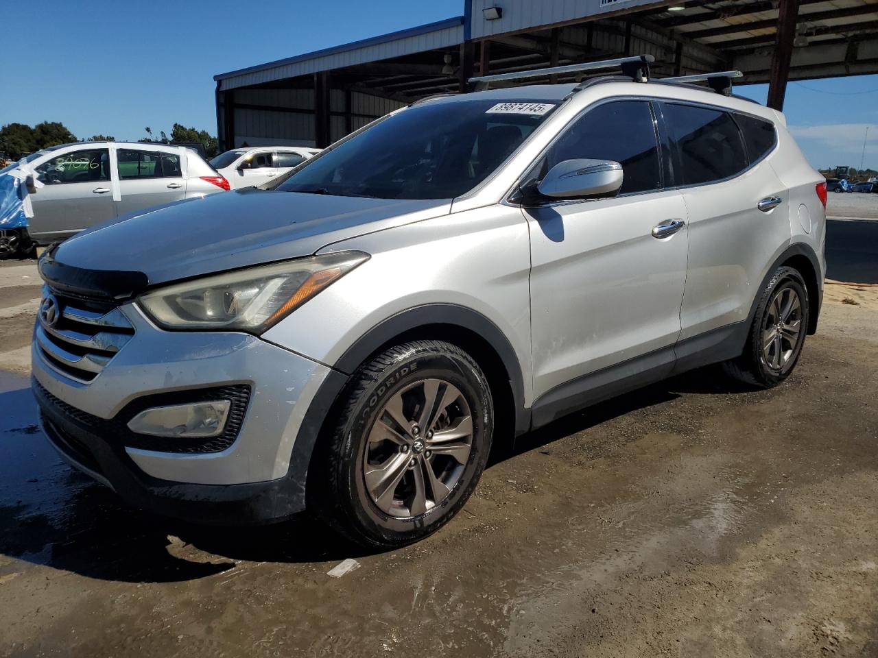 2013 Hyundai Santa Fe Sport, VIN 5XYZU3LBXDG062502 — Front end