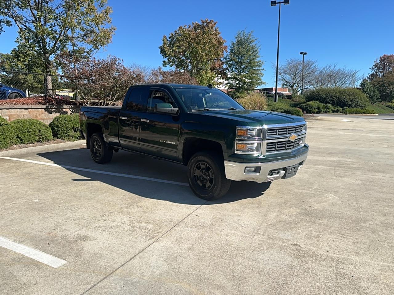 2015 Chevrolet Silverado 1500 LT, VIN 1GCVKREC5FZ336612 — Partial repair