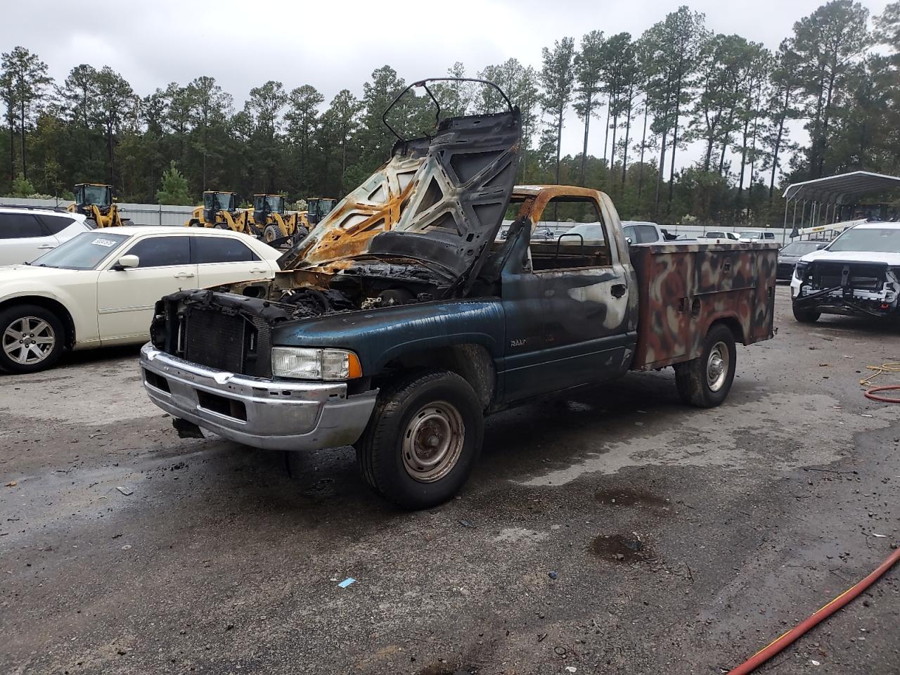 1999 Dodge Ram, VIN 3B6KC26Z6XM585079 — Burn