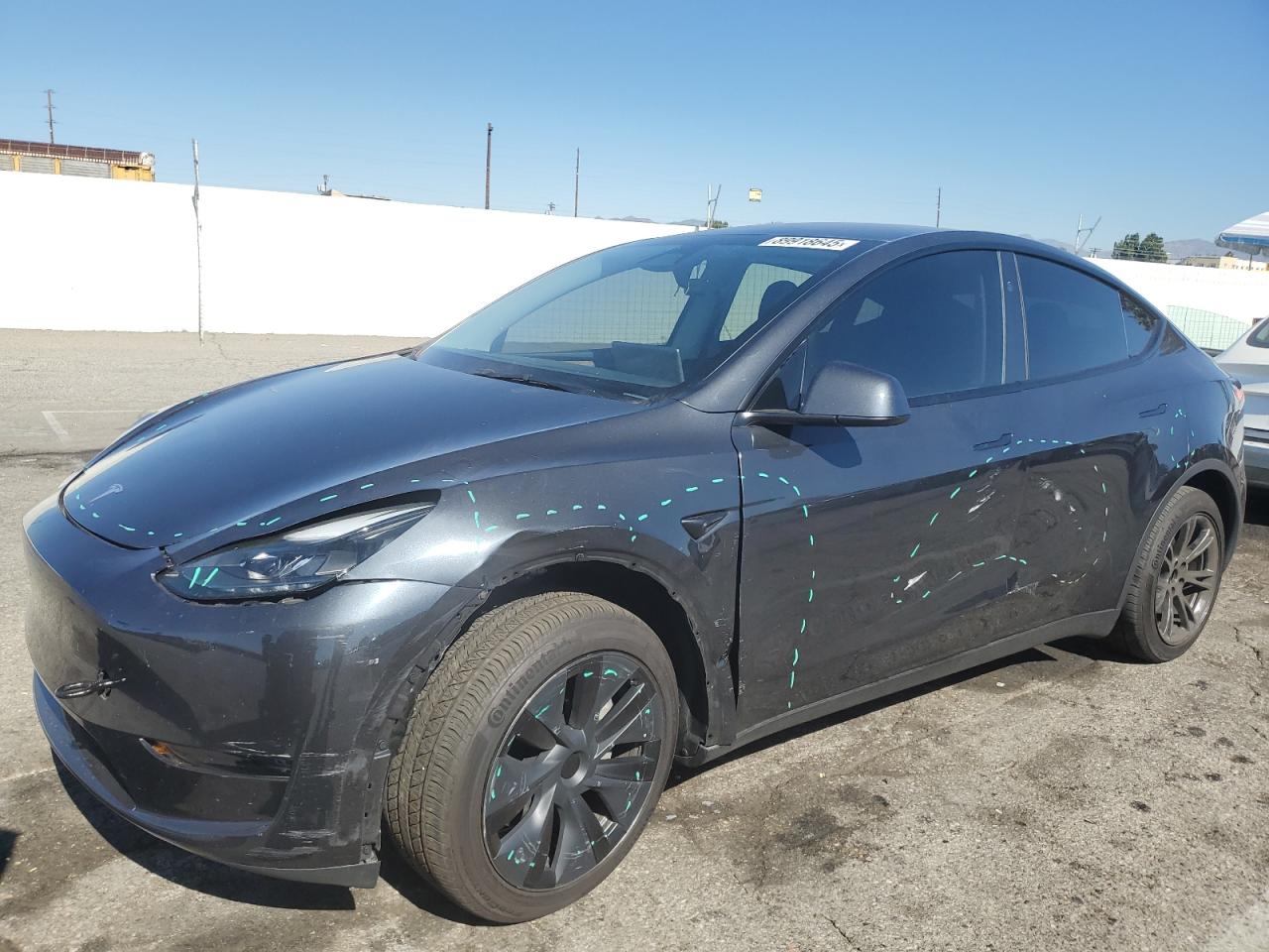 2024 Tesla Model Y, VIN 7SAYGDED7RF098964 — Side