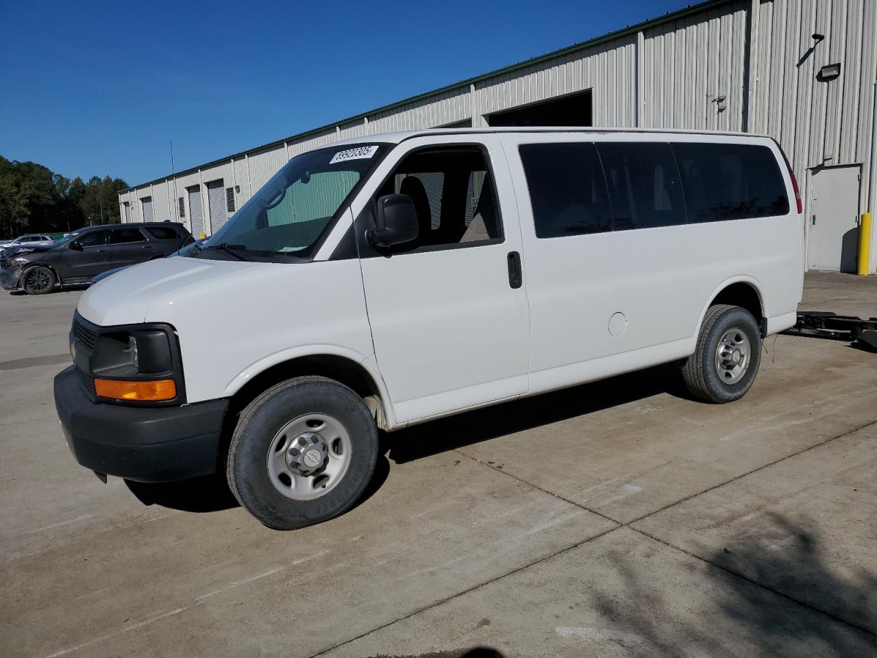 2015 Chevrolet Express Passenger LS, VIN 1GAWGPFG8F1222591 — Rear end
