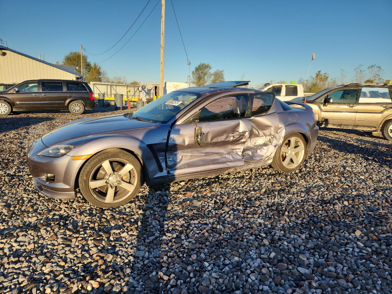 2005 Mazda RX-8, VIN JM1FE17N950147685 — Side