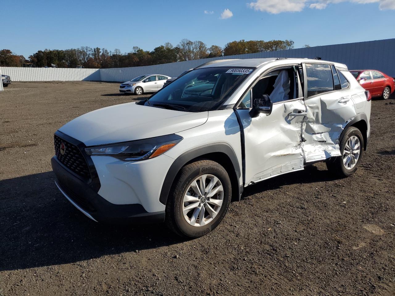 2023 Toyota Corolla Cross LE, VIN 7MUCAABG5PV075087 — Side