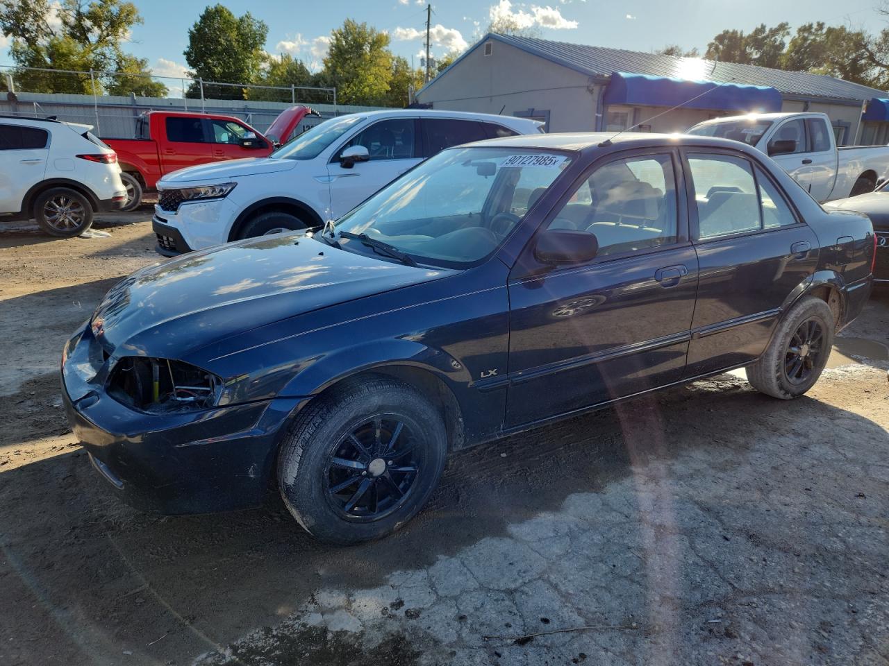 1999 Mazda Protege DX, VIN JM1BJ2228X0164462 — Механическое