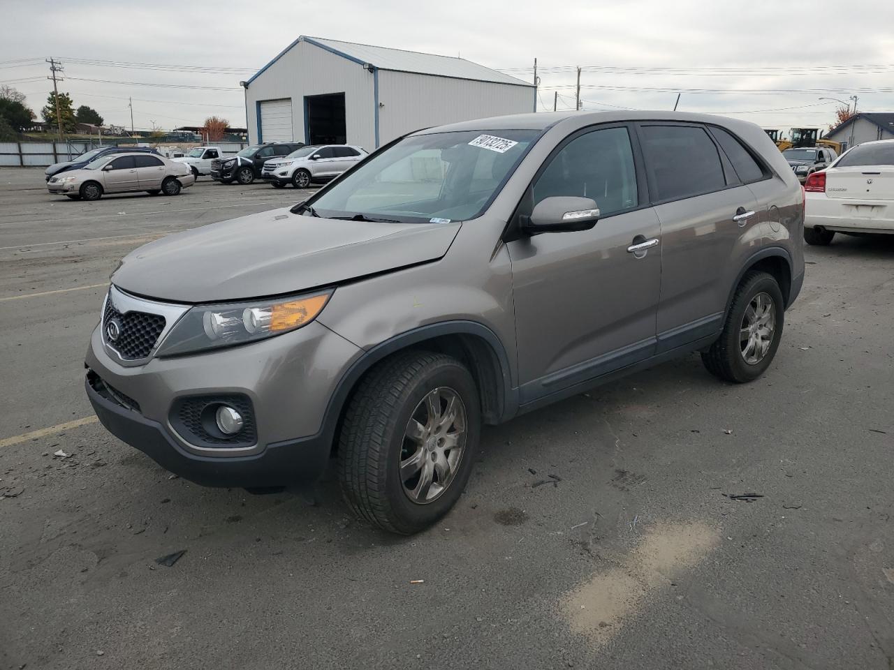 2013 Kia Sorento LX, VIN 5XYKT3A12DG409853 — Front end