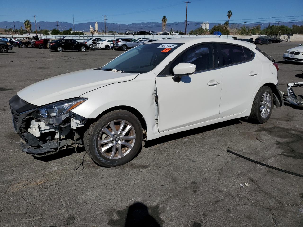 2015 Mazda 3 i Touring, VIN JM1BM1L73F1254381 — Rear end
