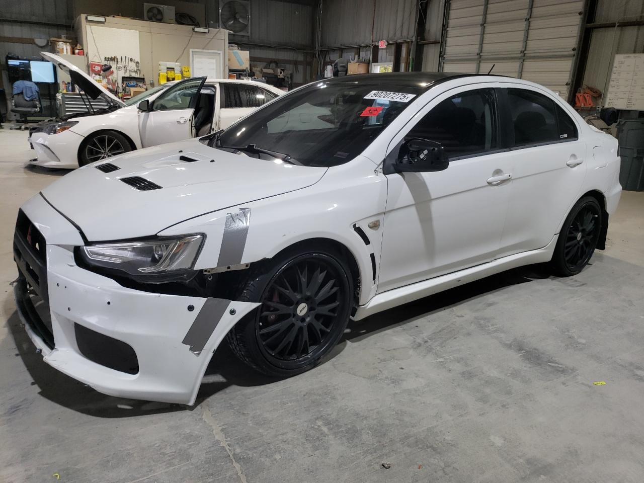 2014 Mitsubishi Lancer Evolution GSR, VIN JA32W8FV1EU016831 — Front end