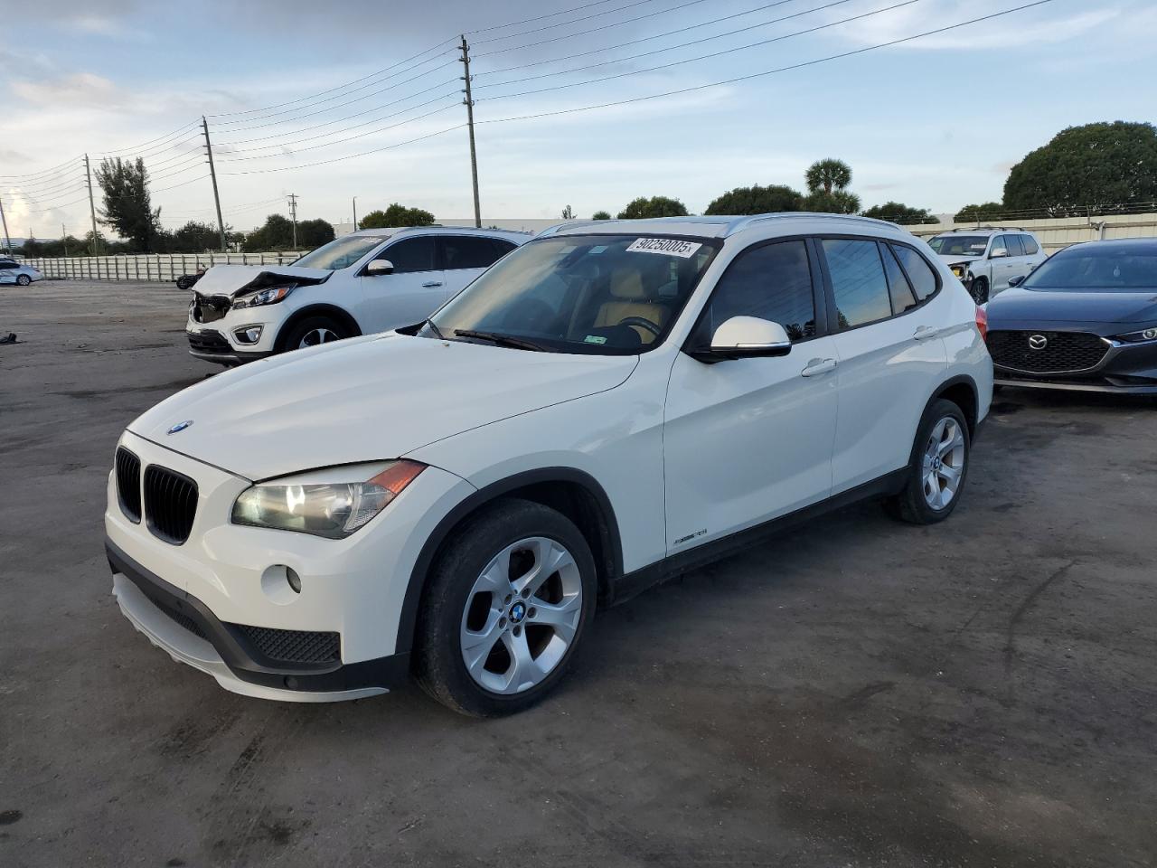 2015 BMW X1 sDrive28i, VIN WBAVM1C52FV314801 — Minor dents and scratches