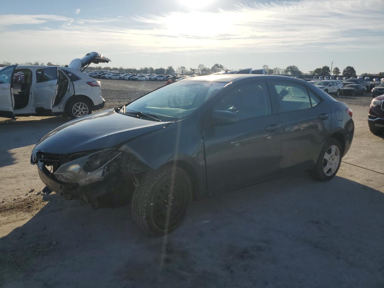 2016 Toyota Corolla LE, VIN 5YFBURHE5GP510233 — Front end