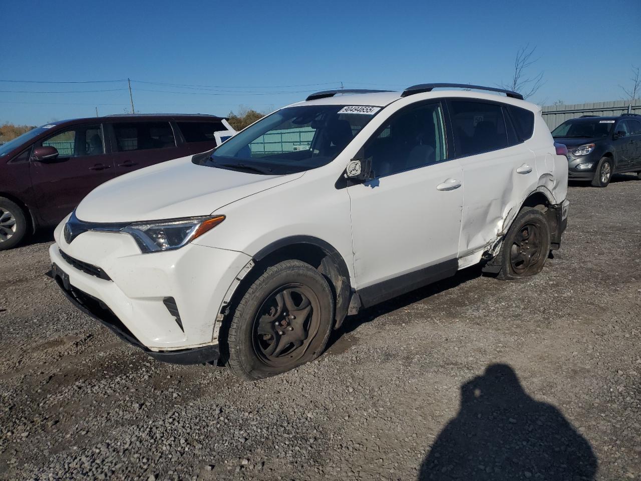 2017 Toyota RAV4 LE, VIN 2T3BFREVXHW565511 — Side