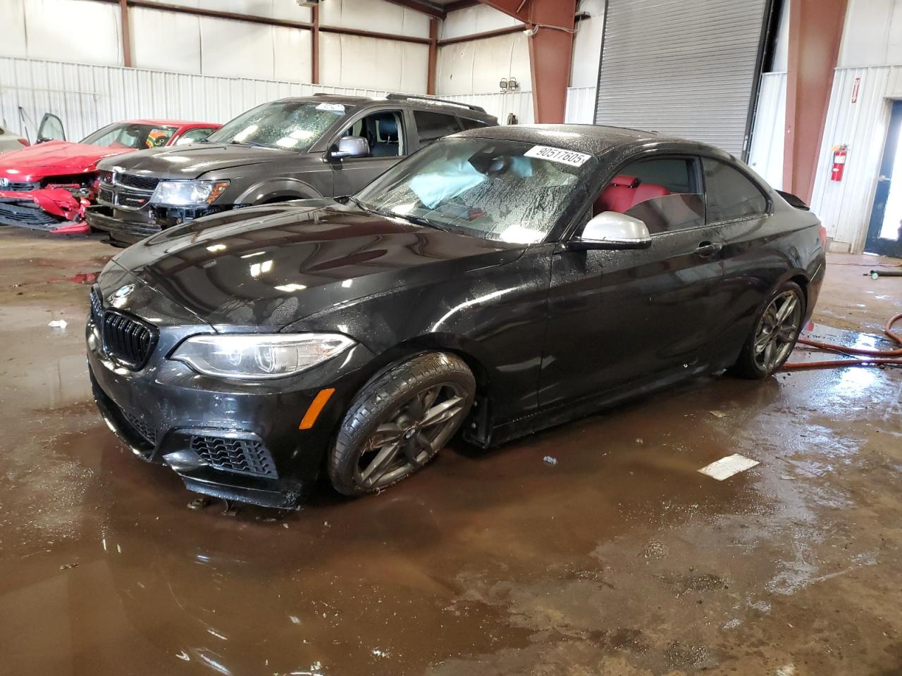 2016 BMW 2 Series M235i, VIN WBA1J7C5XGV359643 — Side