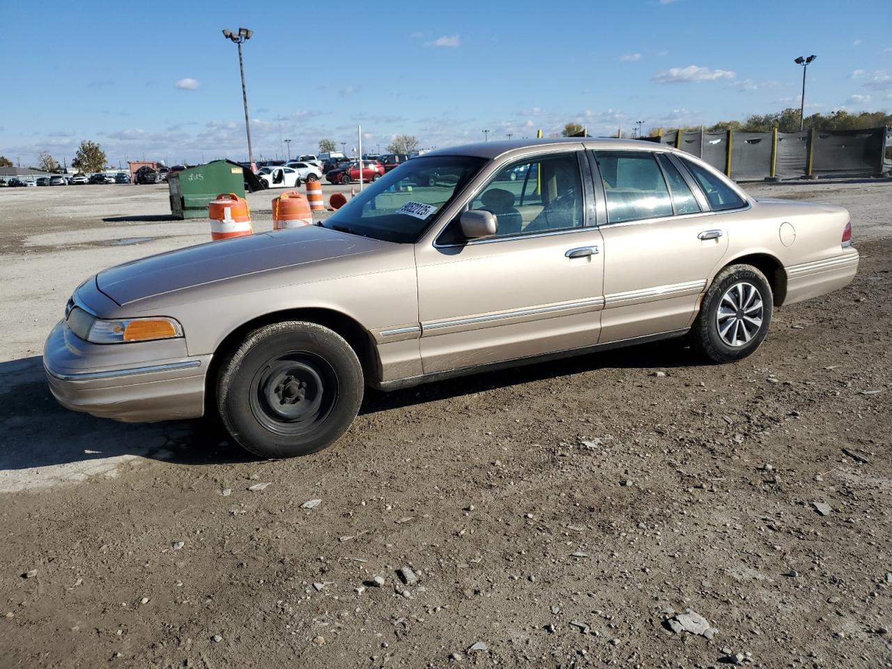 1997 Ford Crown Victoria, VIN 2FALP73W2VX148831 — Side