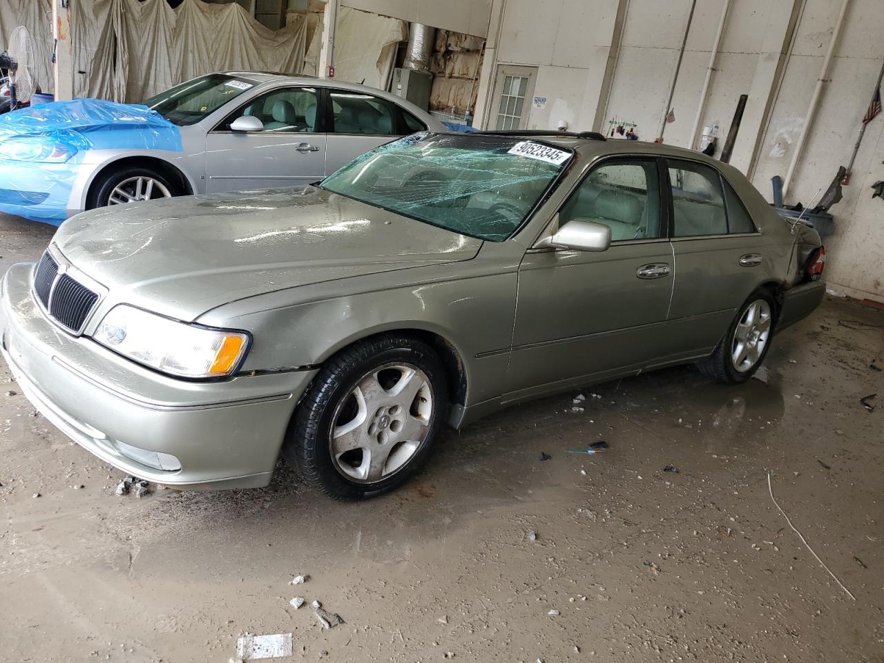 1999 Infiniti Q45, VIN JNKBY31A8XM604021 — Rollover