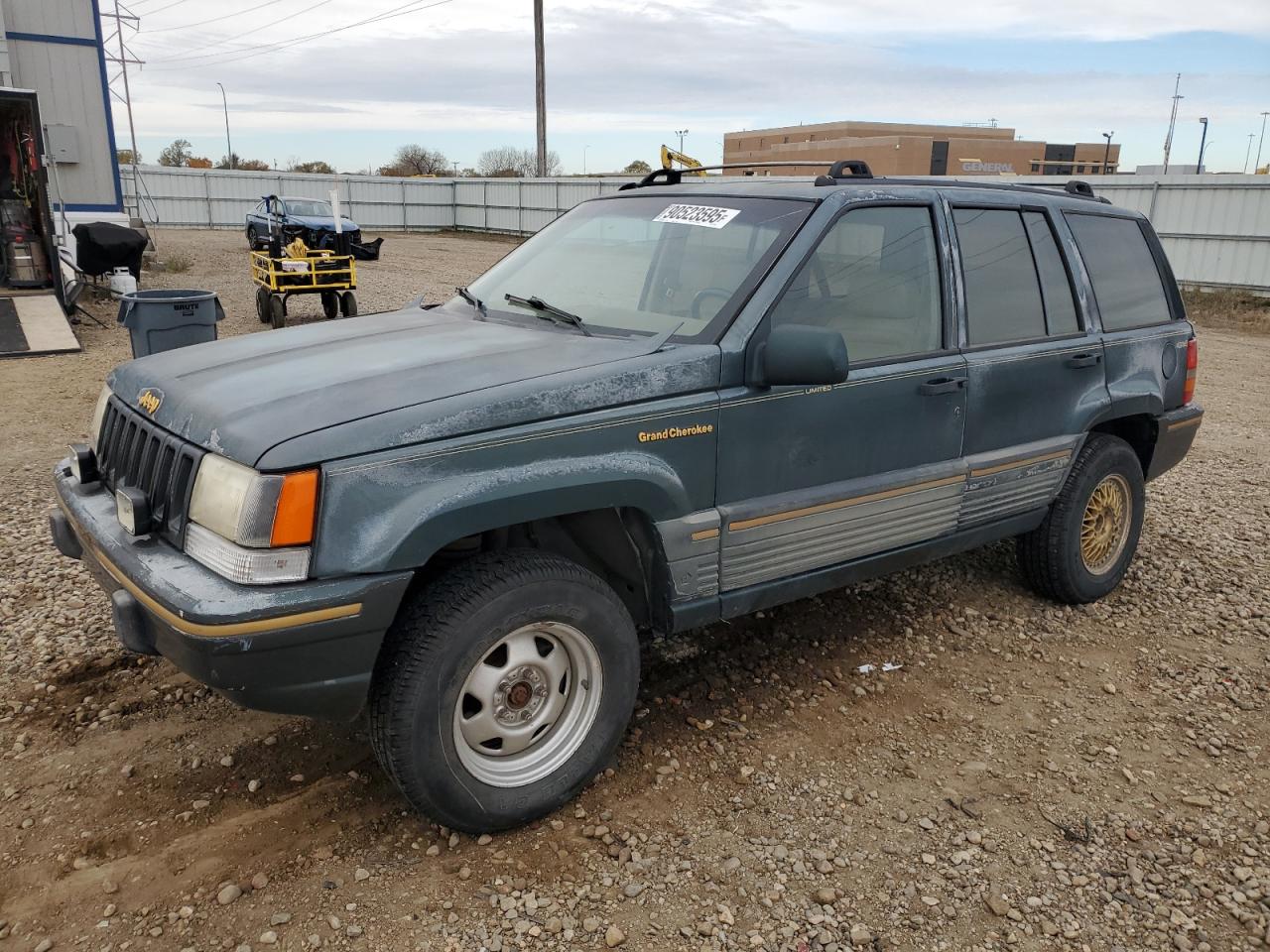 1993 Jeep Grand Cherokee Limited, VIN 1J4GZ78Y0PC710025 — Side