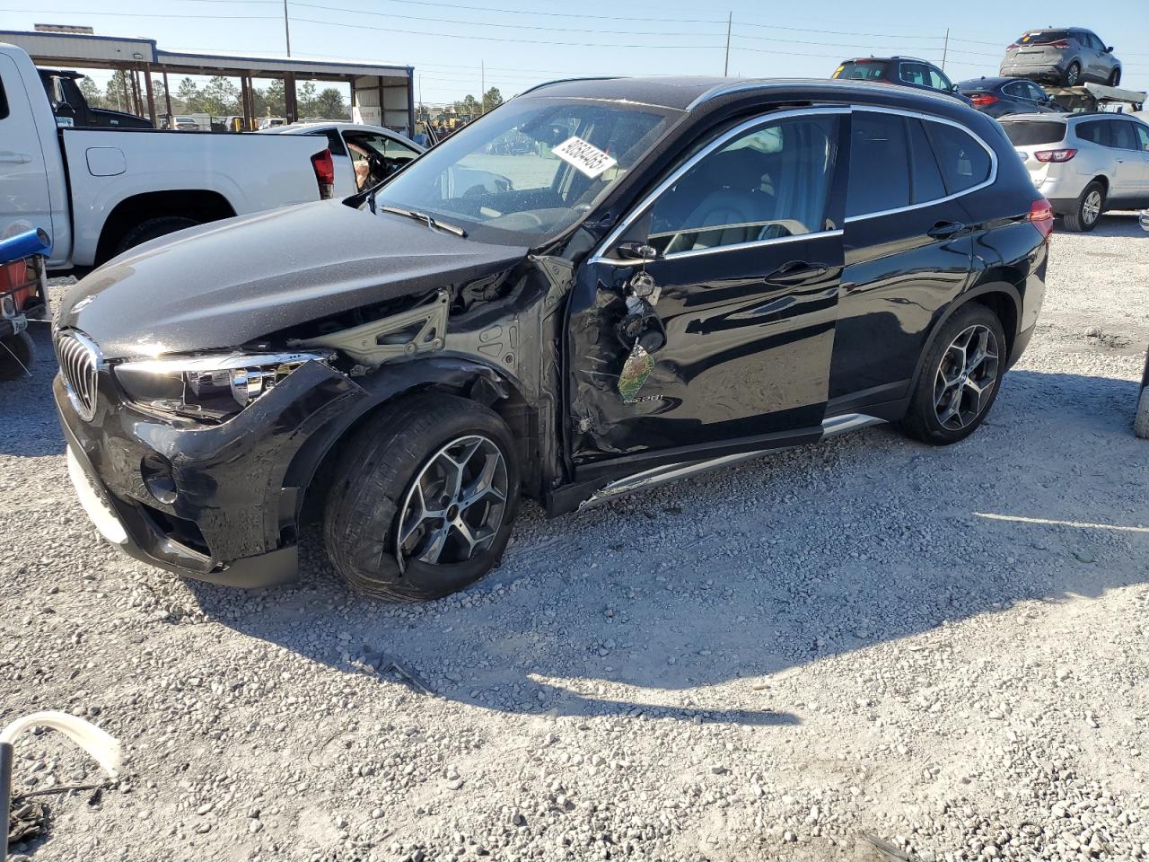 2018 BMW X1 sDrive28i, VIN WBXHU7C3XJ5H44771 — Front end