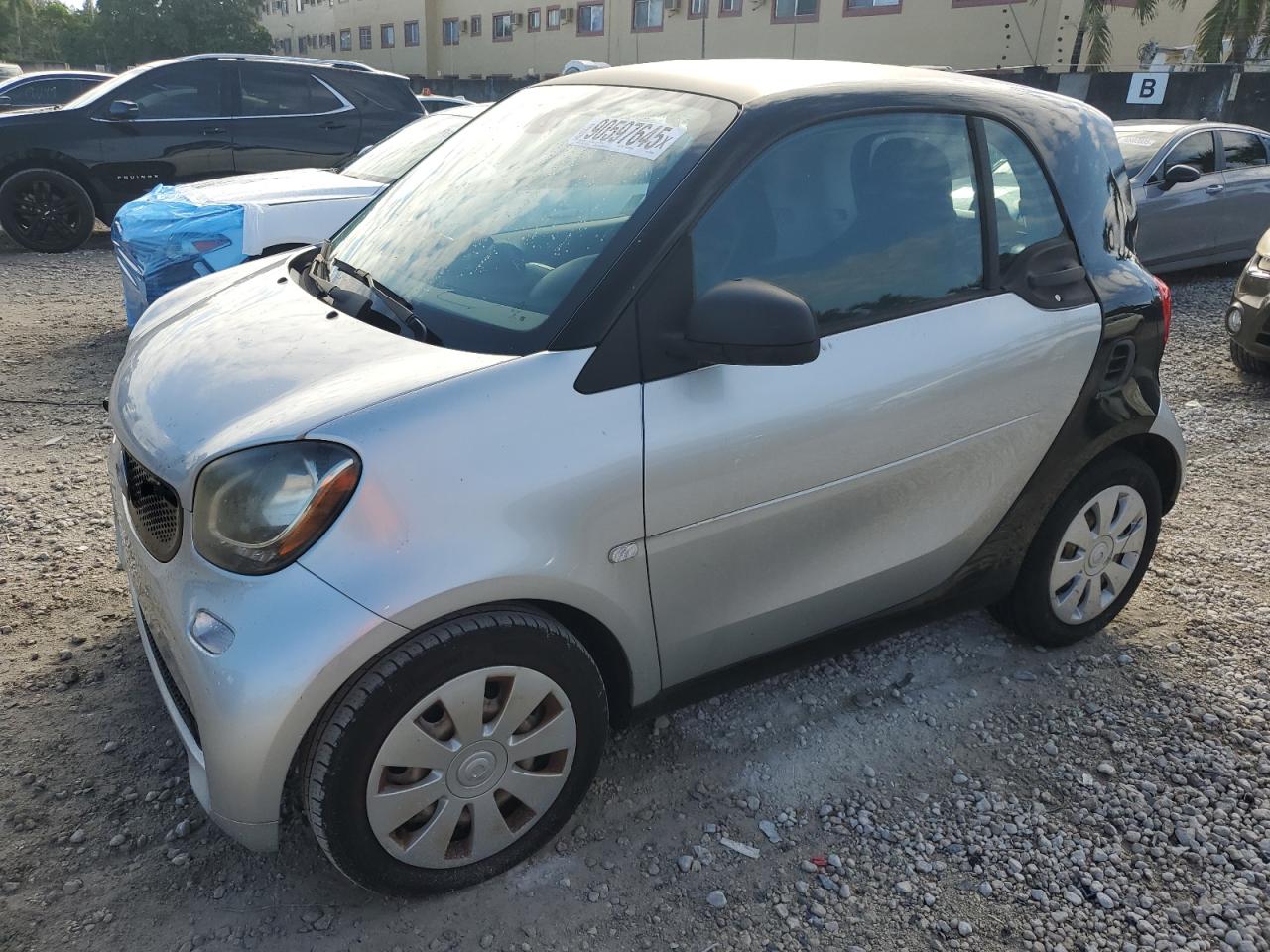 2016 Smart fortwo Prime, VIN WMEFJ5DA3GK076996 — Water / flood