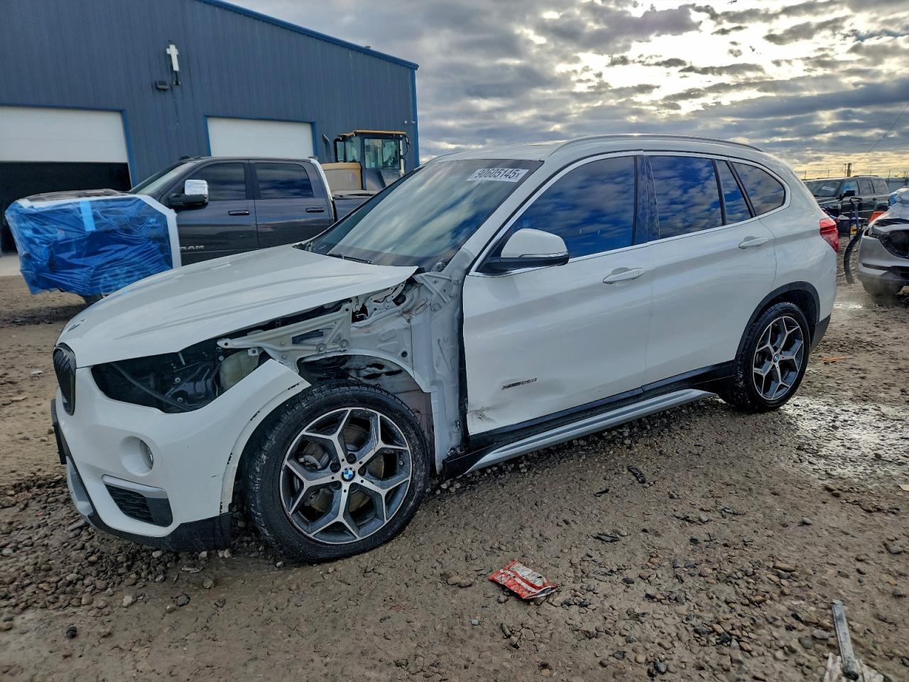 2018 BMW X1 xDrive28i, VIN WBXHT3C31J5K24306 — Front end