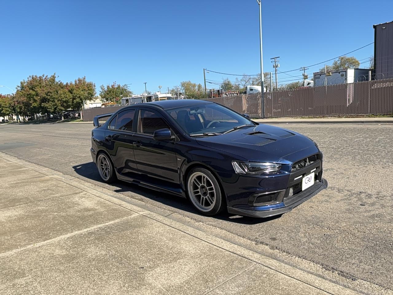 2013 Mitsubishi Lancer Evolution GSR, VIN JA32W8FV1DU024118 — Minor dents and scratches