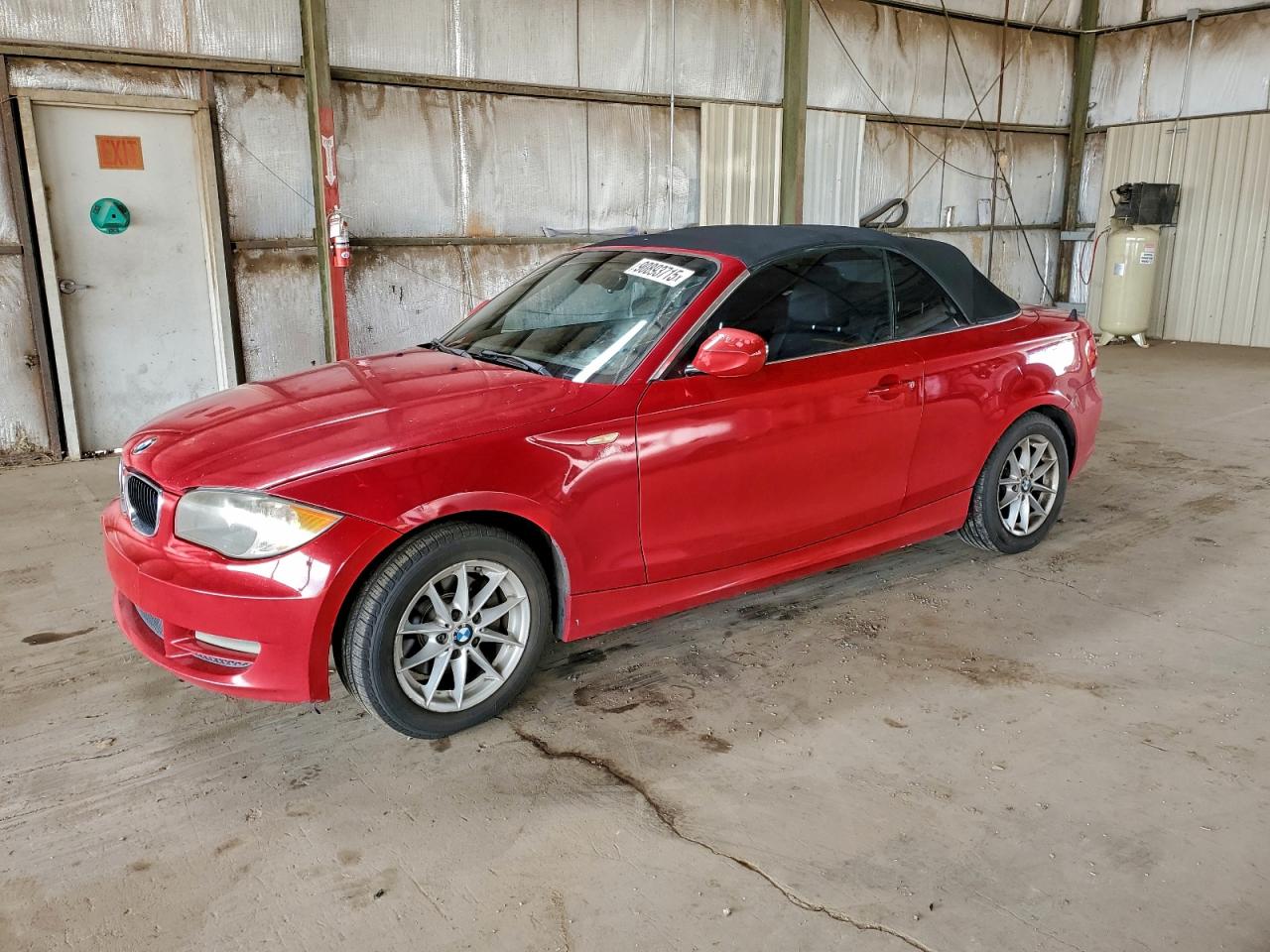 2011 BMW 1 Series 128i, VIN WBAUN1C53BVH83398 — Side