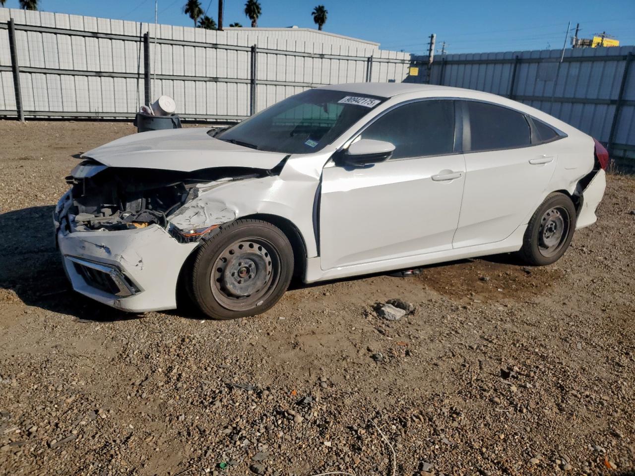 2020 Honda Civic LX, VIN 19XFC2F65LE006705 — Auction photo