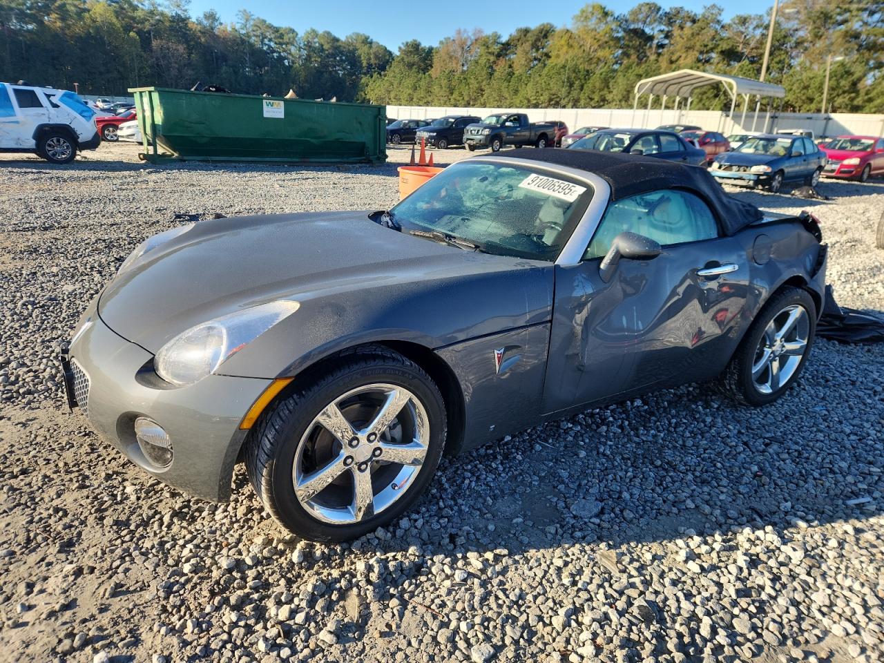 2009 Pontiac Solstice, VIN 1G2MN35B39Y103270 — Side