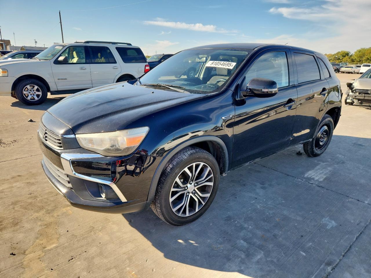 2016 Mitsubishi Outlander ES, VIN JA4AP3AU4GZ030511 — Rear end