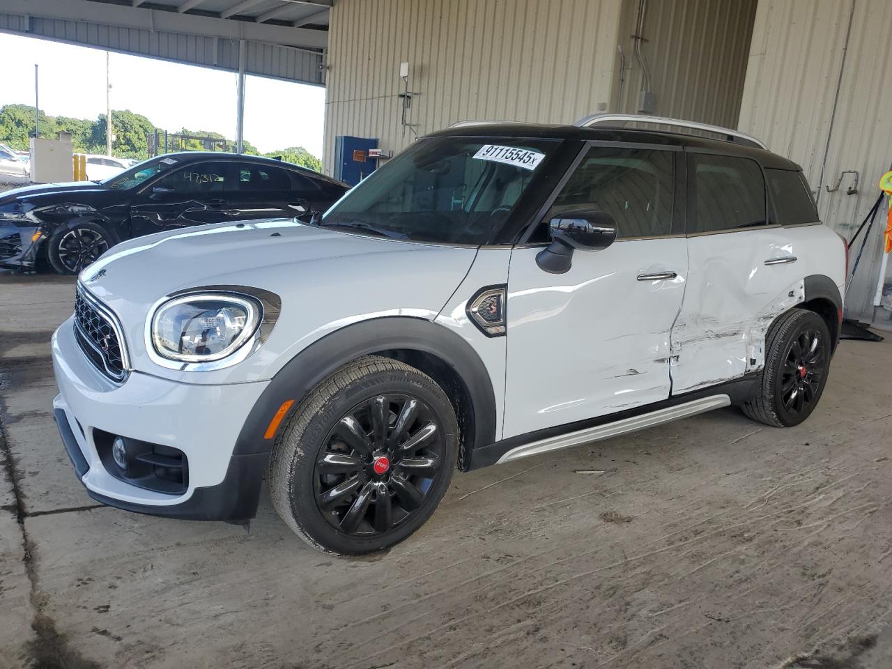 2020 MINI Countryman Cooper S, VIN WMZYW7C04L3M20594 — Бок
