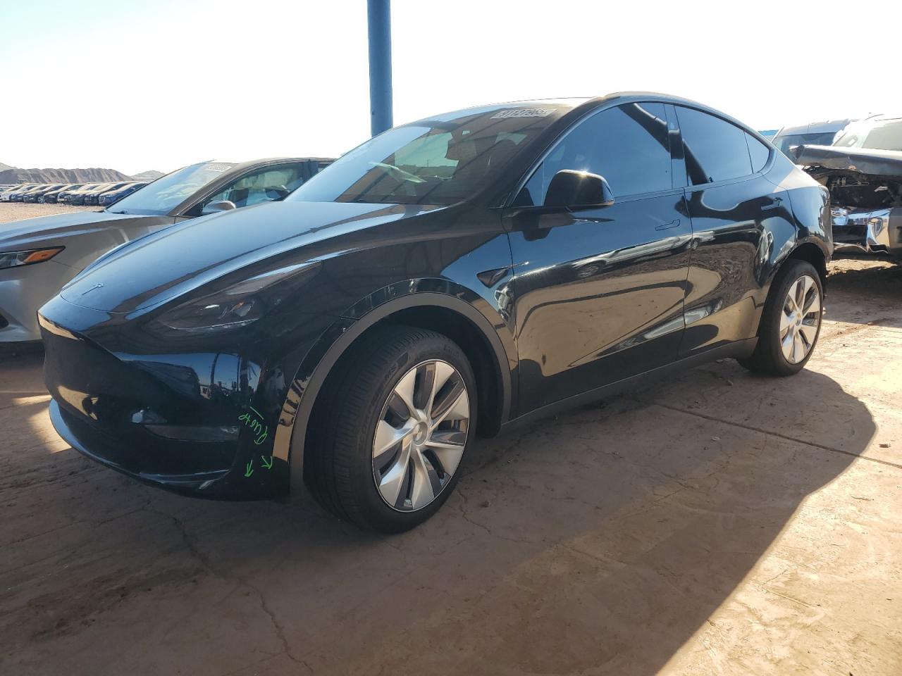 2024 Tesla Model Y Long Range, VIN 7SAYGDEE2RA273417 — Rear end