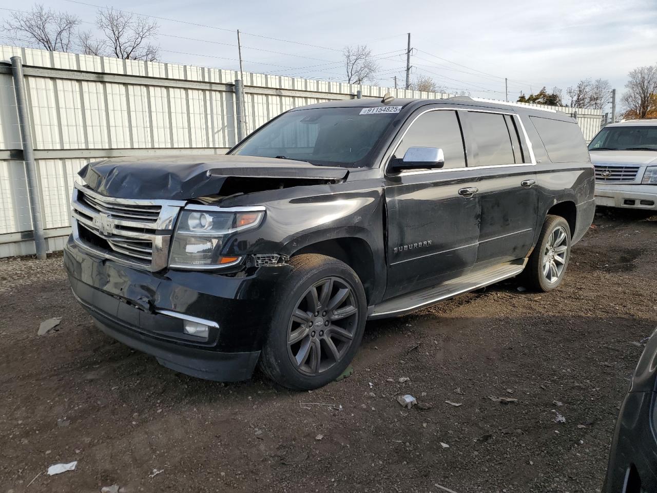 2015 Chevrolet Suburban LTZ, VIN 1GNSKKKC1FR256102 — Front end