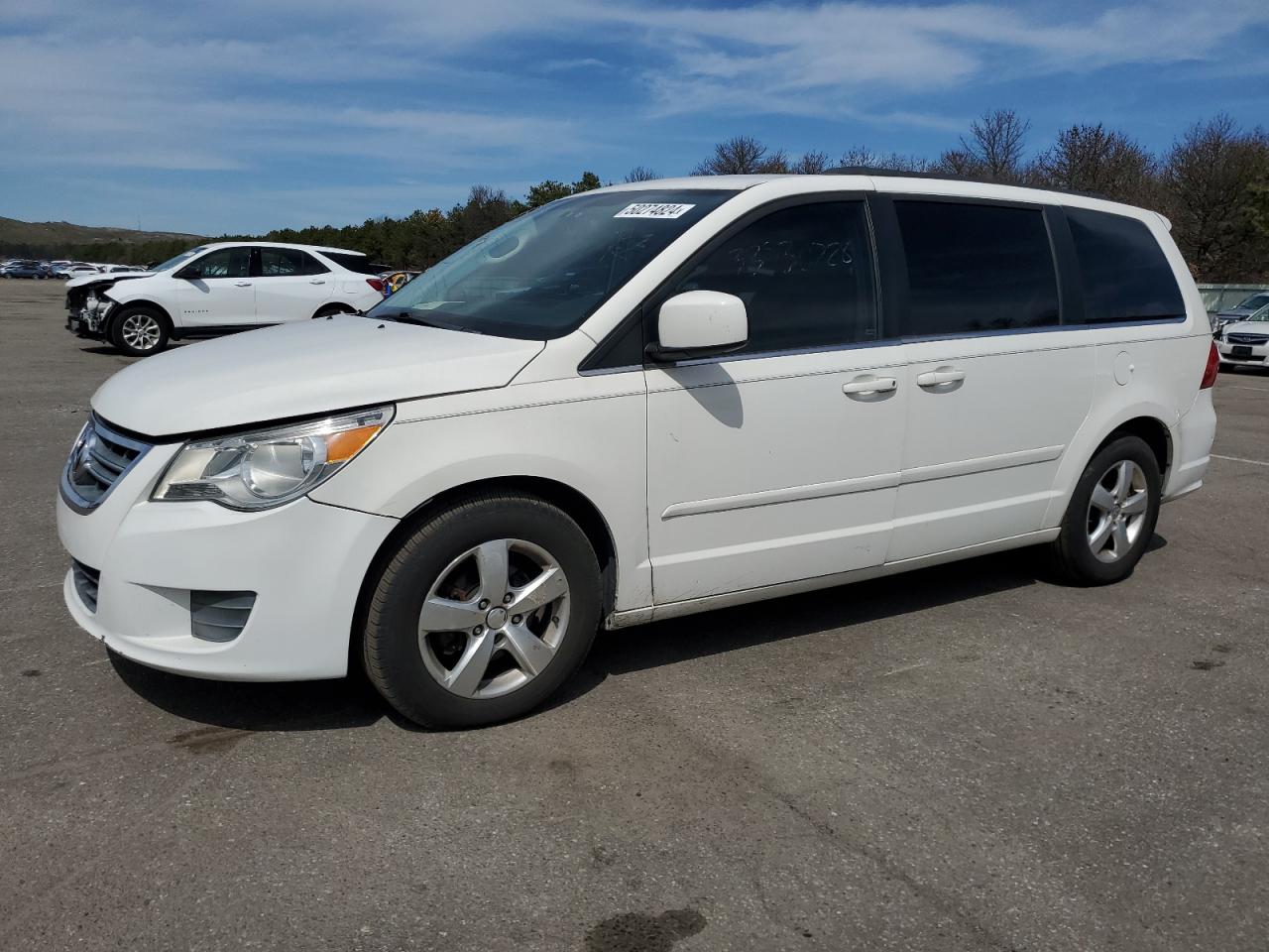 2011 Volkswagen Routan SE, VIN 2V4RW3DG5BR717538 — Мелкие вмятины и царапины