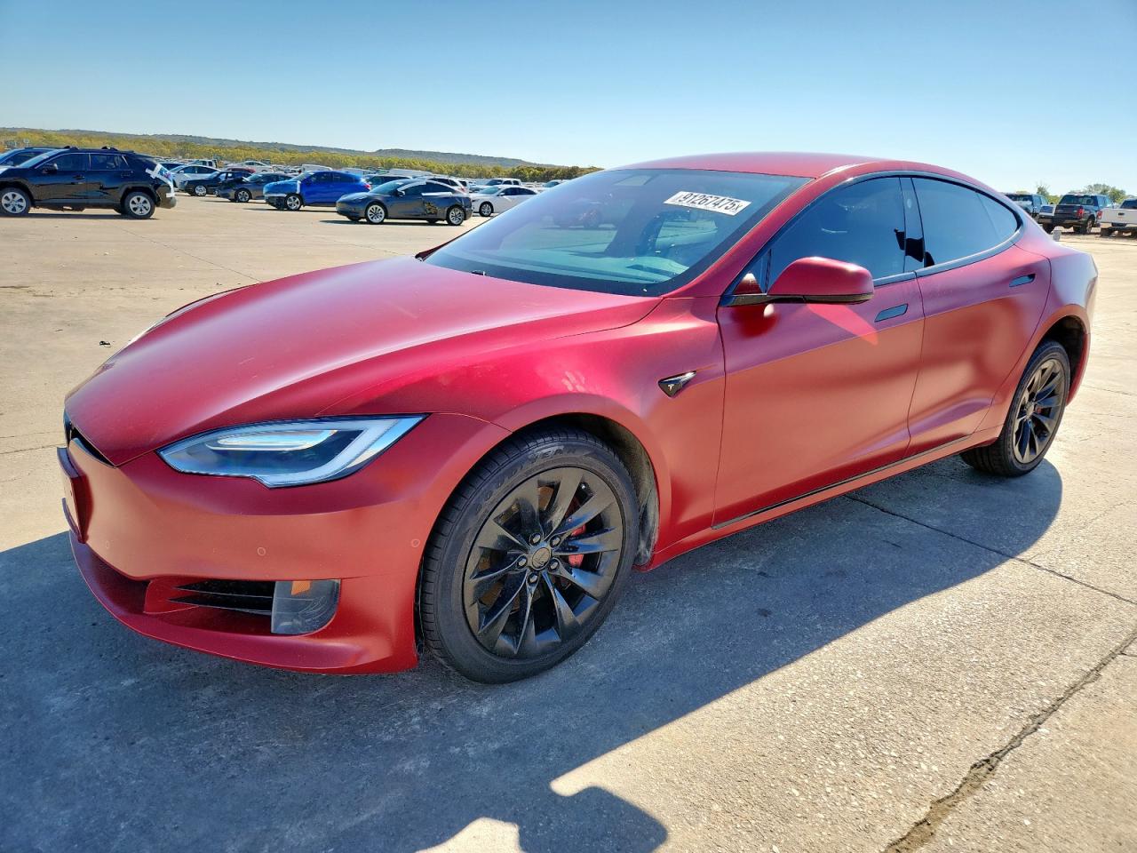 2016 Tesla Model S 70, VIN 5YJSA1E12GF163581 — Vandalism