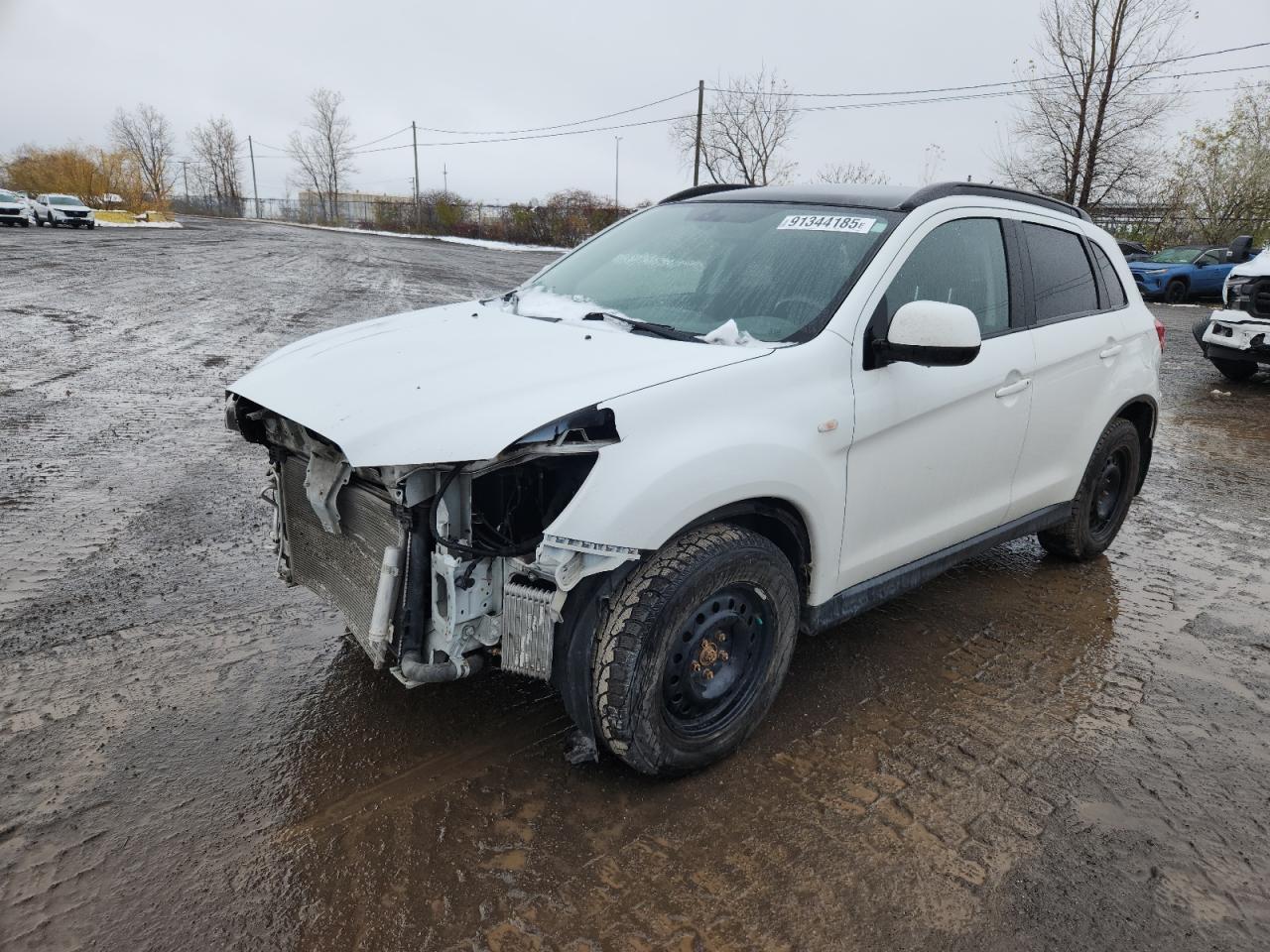 2011 Mitsubishi Outlander Sport GT, VIN JA4AJ4AU8BZ606469 — Front end