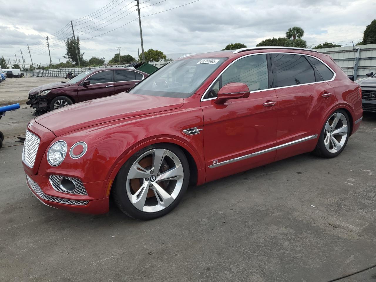 2017 Bentley Bentayga W12, VIN SJAAC2ZV1HC014037 — Water / flood