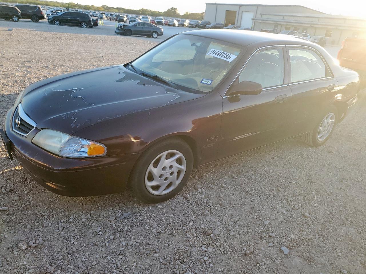 2002 Mazda 626 LX, VIN 1YVGF22C225299300 — Rear end
