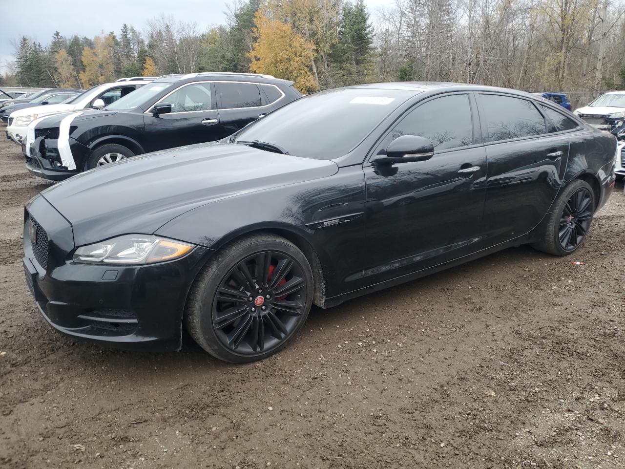 2015 Jaguar XJ Portfolio, VIN SAJXJ2GD2F8V85322 — Undercarriage