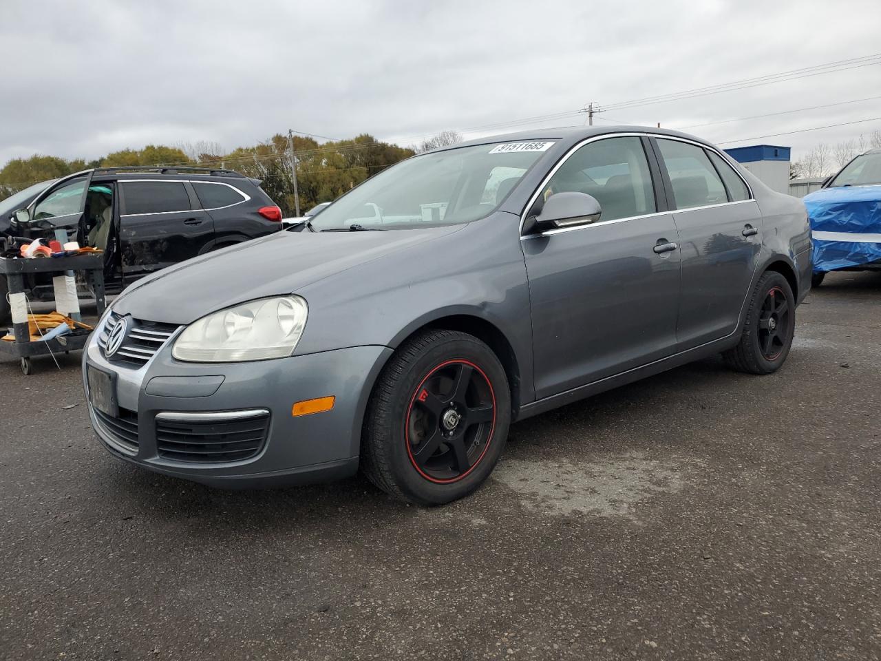 2009 Volkswagen Jetta SE, VIN 3VWRM71K99M150085 — Мелкие вмятины и царапины