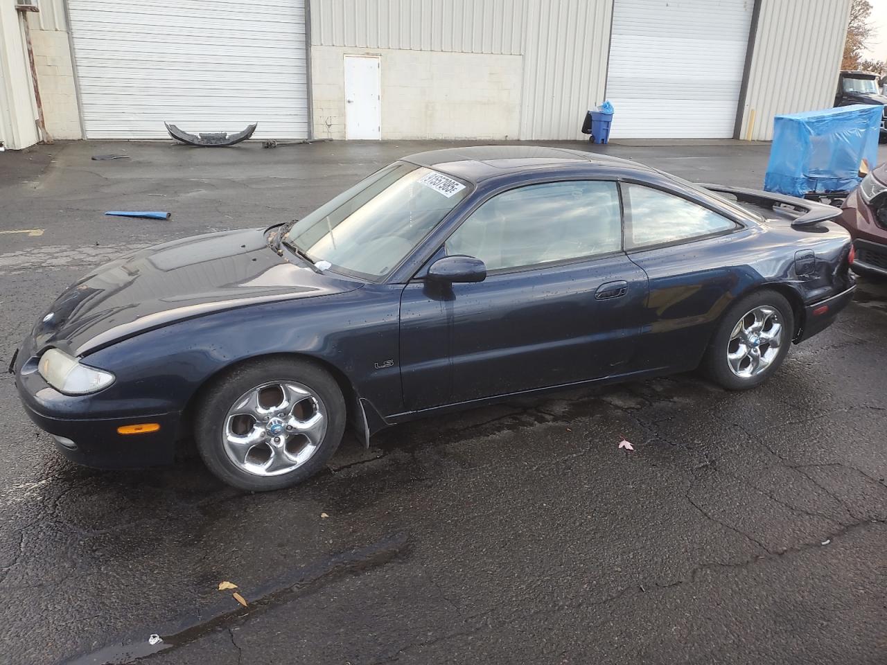 1994 Mazda MX-6 LS, VIN 1YVGE31D0R5128252 — Rear end