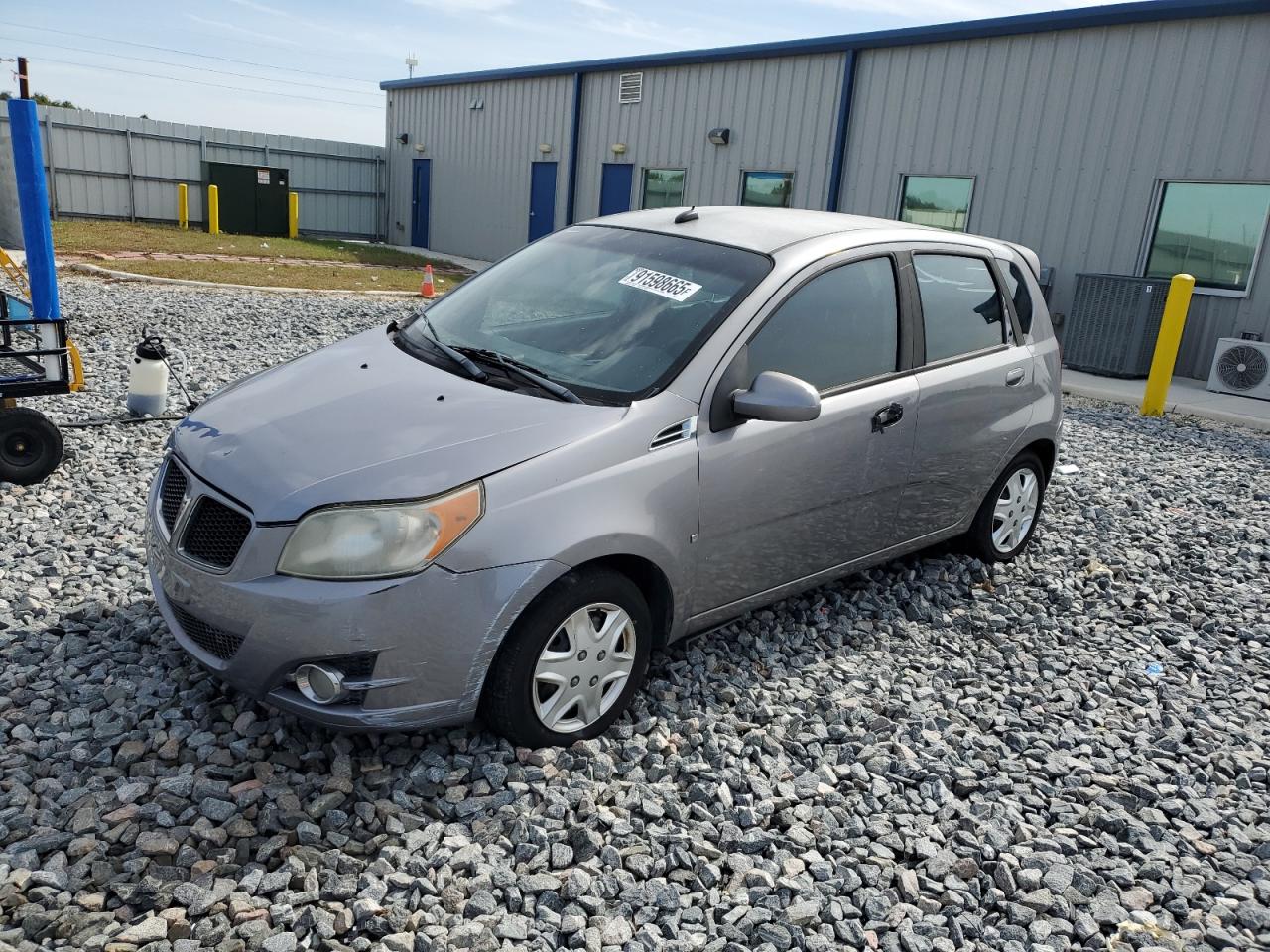 2009 Pontiac G3, VIN KL2TD66E09B663838 — Water / flood