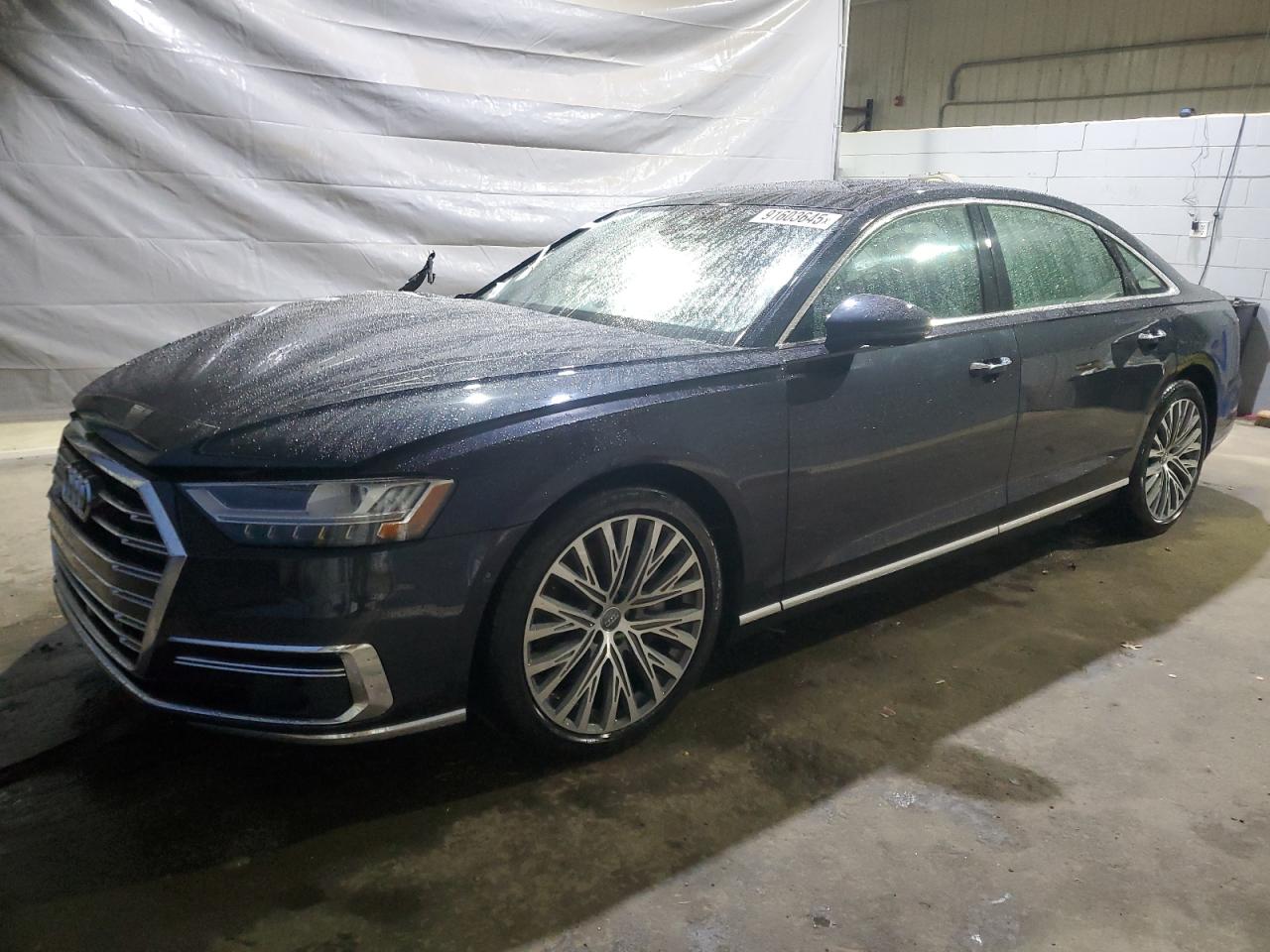 2019 Audi A8, VIN WAU8DAF88KN007243 — Side