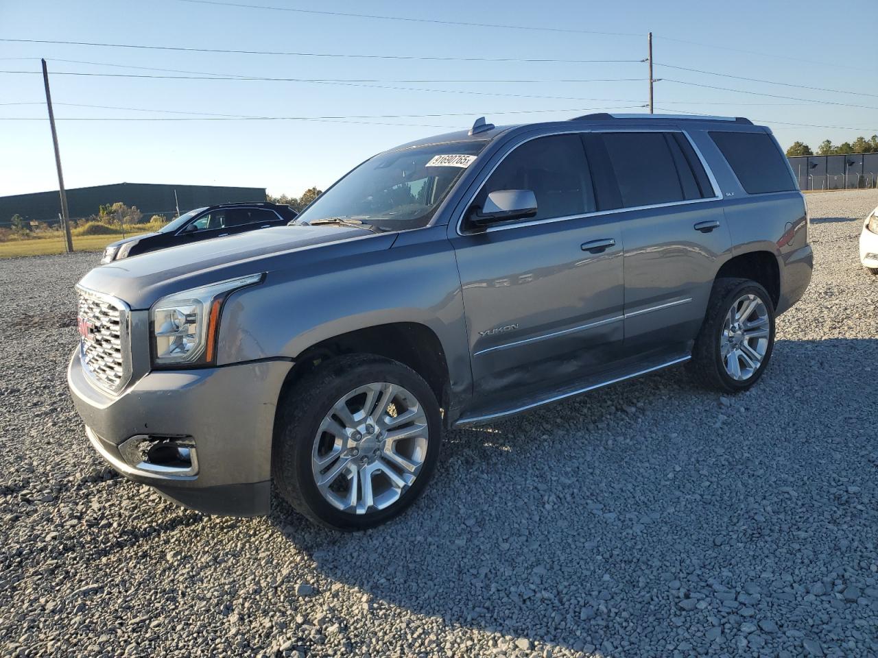 2019 GMC Yukon SLT, VIN 1GKS1BKCXKR332488 — Side