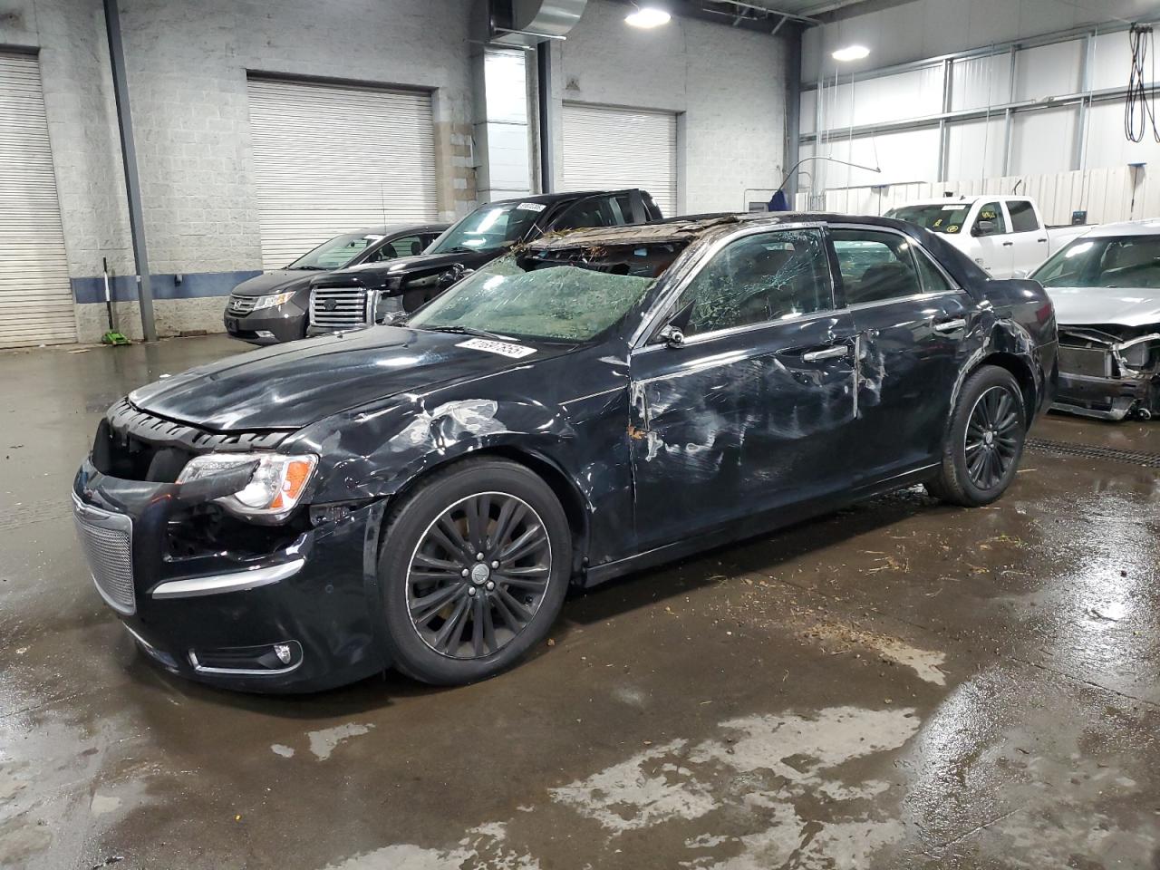 2014 Chrysler 300 C John Varvatos Luxury Edition, VIN 2C3CCAJTXEH132855 — Rollover