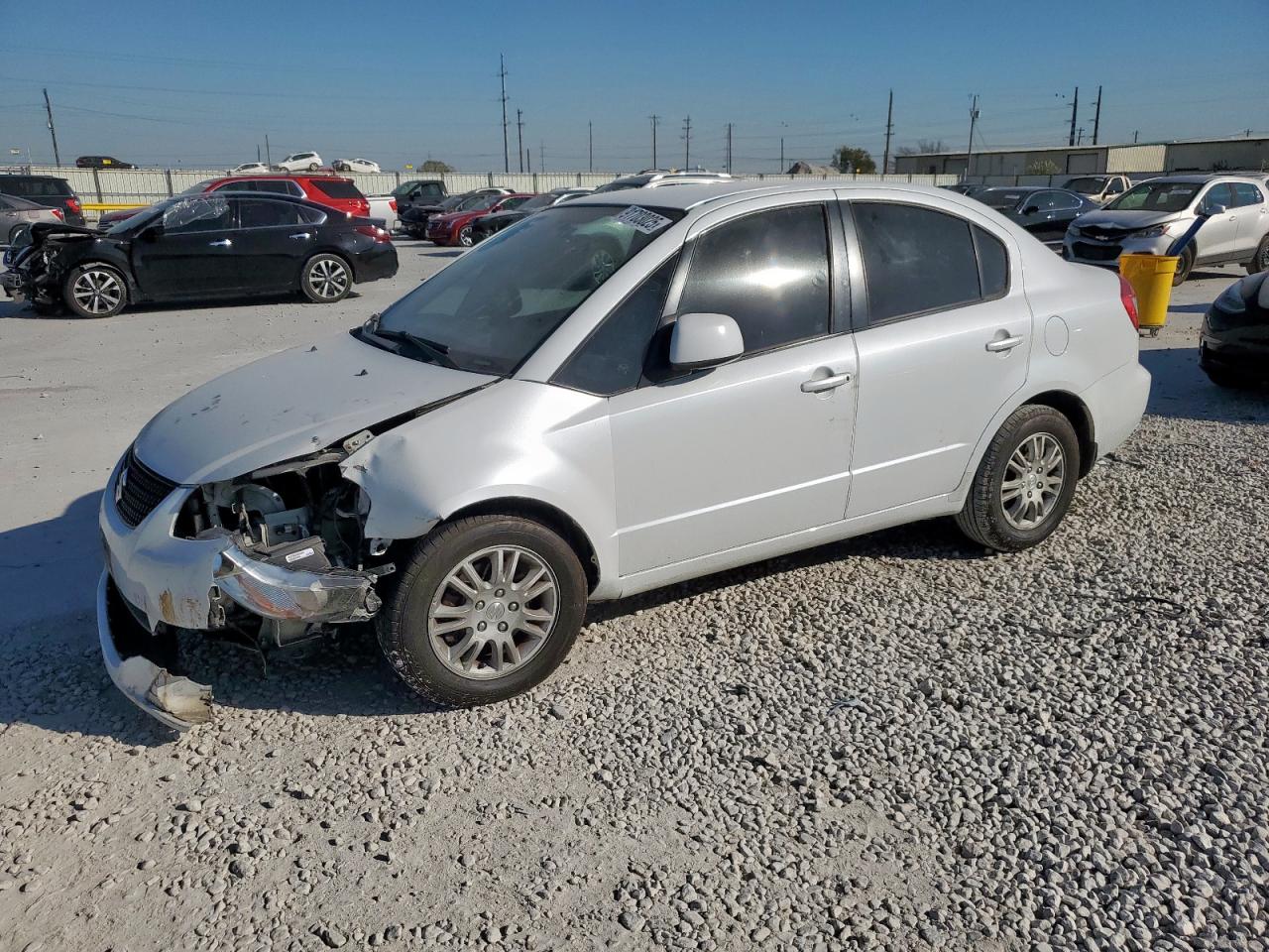 2012 Suzuki SX4 LE, VIN JS2YC5A37C6303297 — Front end
