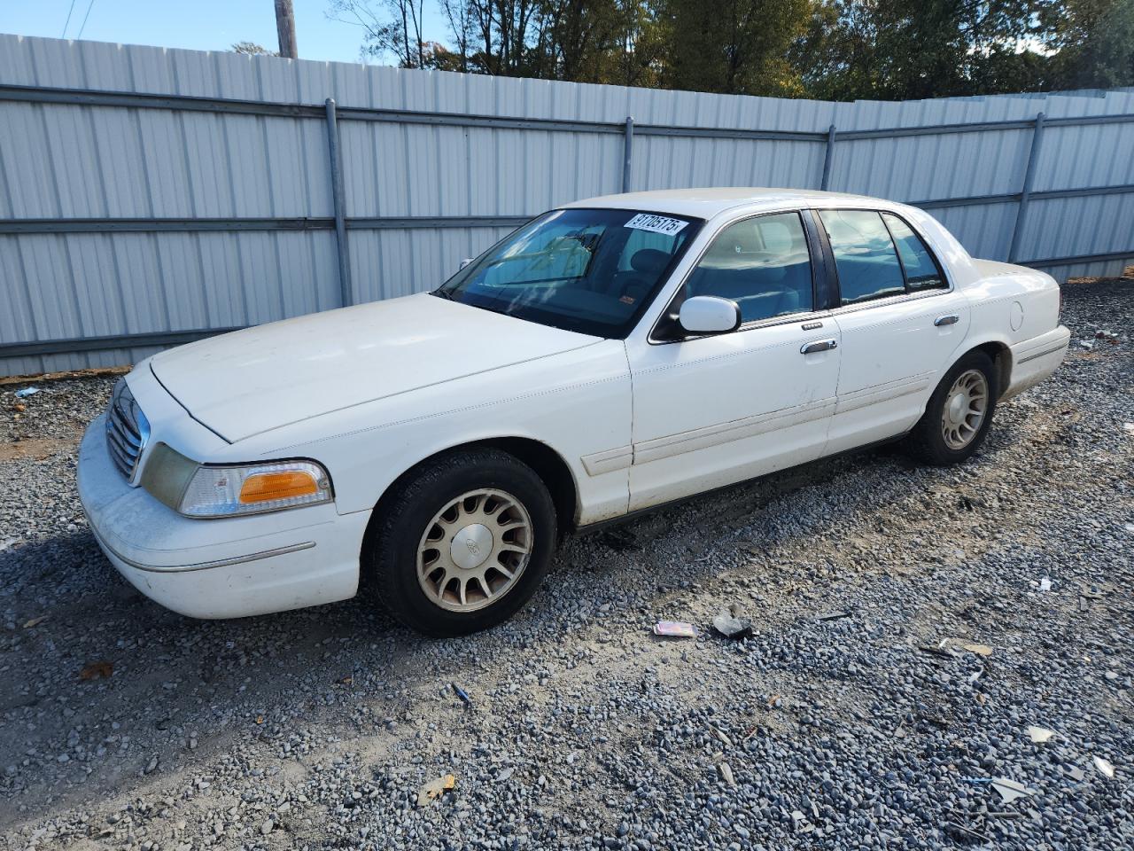1998 Ford Crown Victoria LX, VIN 2FAFP74W7WX121699 — Rear end