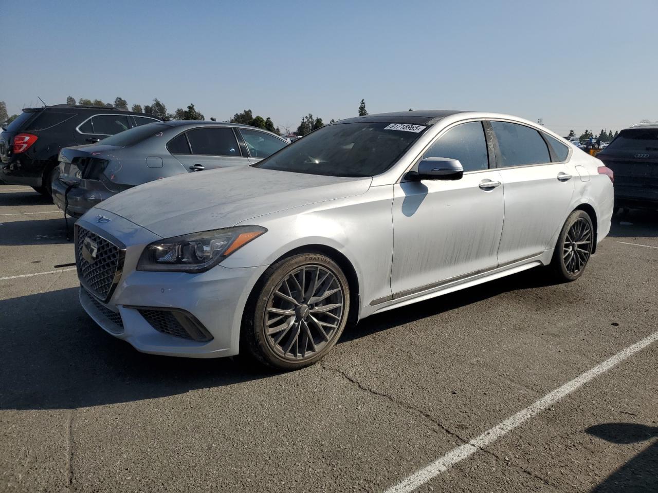 2019 Genesis G80 3.8L, VIN KMTFN4JEXKU309470 — Side