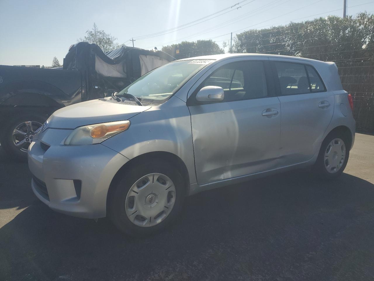 2010 Scion xD, VIN JTKKU4B44AJ055530 — Side