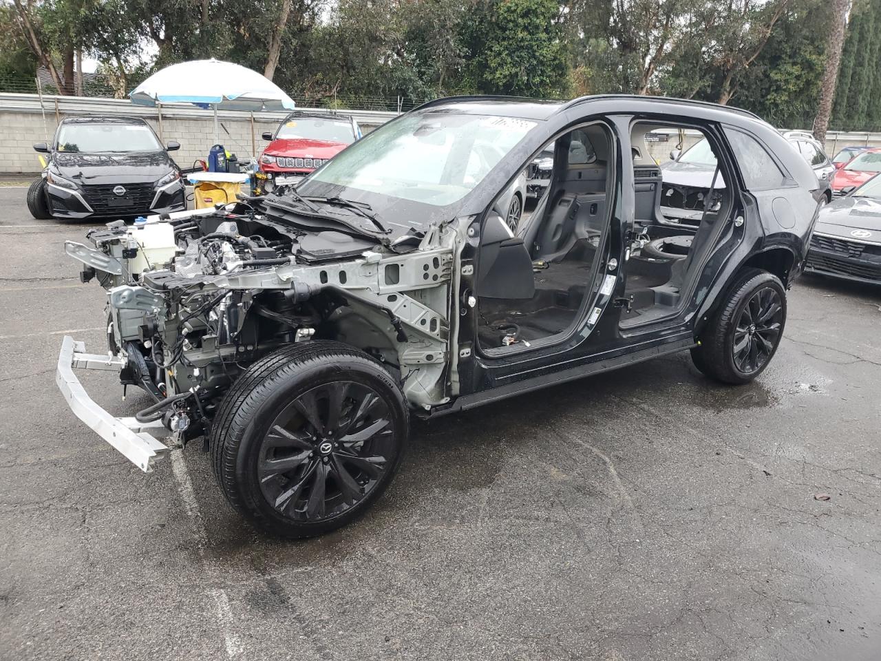 2025 Mazda CX-90 Premium Sport, VIN JM3KKCHA6S1198721 — Stripped