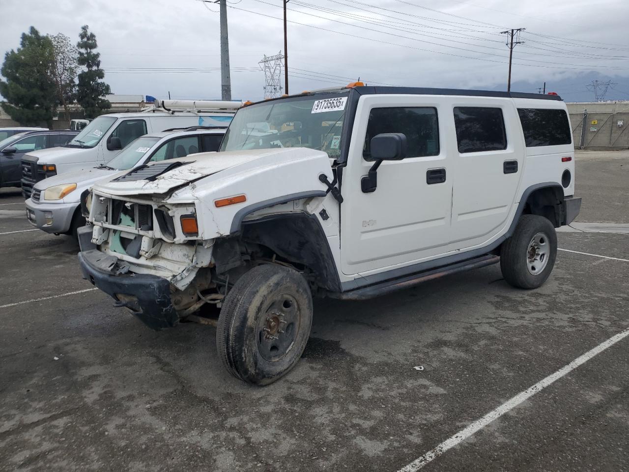 2003 Hummer H2, VIN 5GRGN23U83H141400 — Vandalism