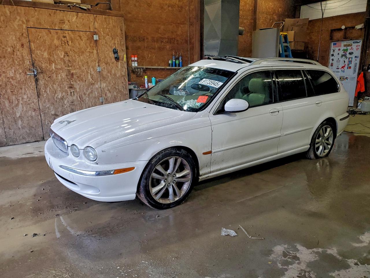 2007 Jaguar X-Type, VIN SAJWA54AX7WJ07718 — Side