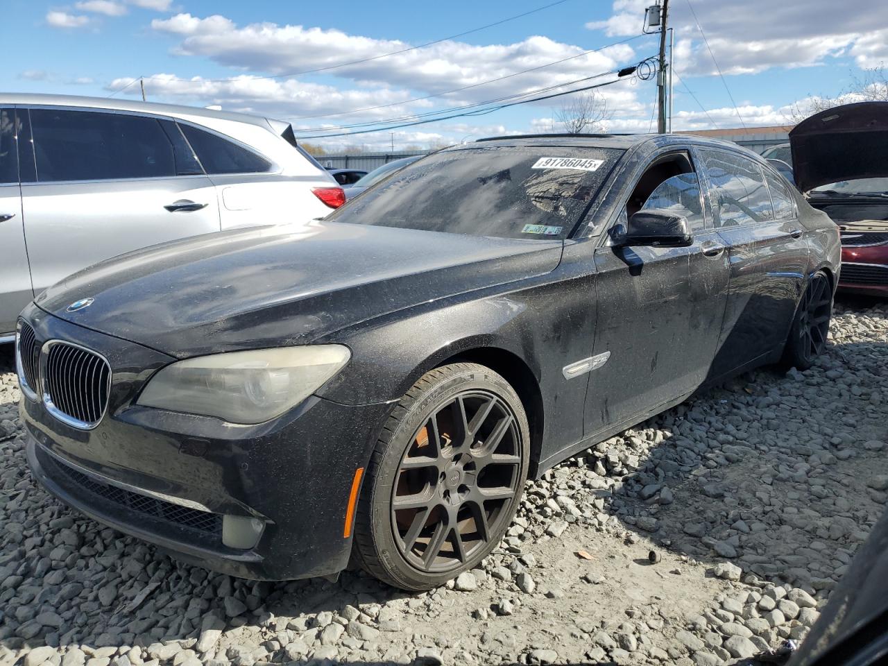 2011 BMW 7 Series 750Li xDrive, VIN WBAKC8C52BC432013 — Normal wear