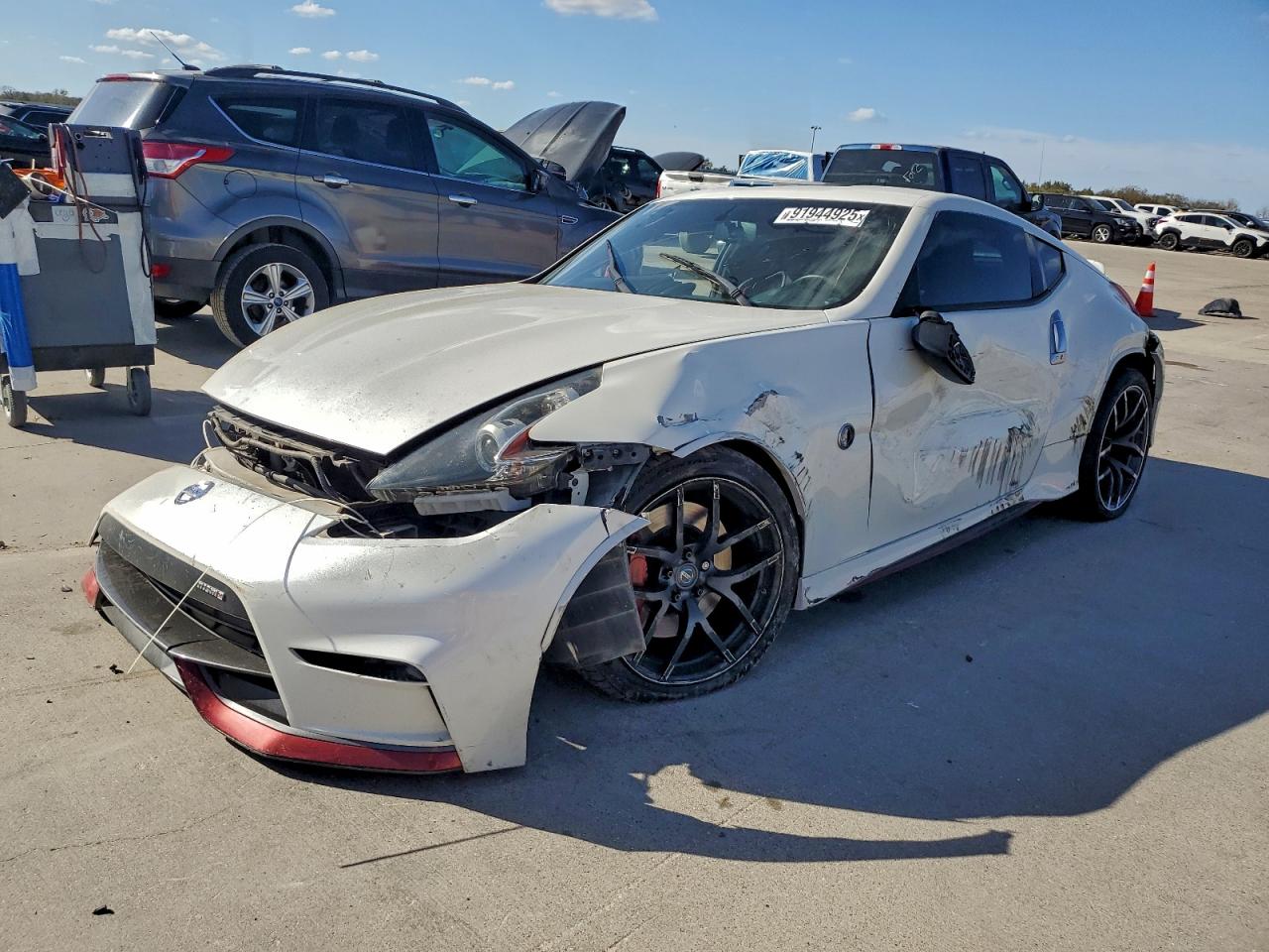 2016 Nissan 370Z Nismo, VIN JN1AZ4EH3GM933185 — Side